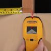 The StudSensor™ e50 stud finder locates the edges of wood and metal studs and joists behind walls, floors, and ceilings. Its easy-to-read display screen indicates stud edges, the patented SpotLite® Pointer shines a beam of light on the wall to identify the target, and WireWarning®detection indicates the presence of live AC voltage. Patented pivot pinch grip design and contoured shape provide an easy, secure hold in either hand, at any angle. - Locates the edges of wood or metal studs up to 3/4 in. (19 mm) deep - DeepScan® mode doubles the scanning depth to 1 1/2 in. (38 mm) - Easy-to-read LCD indicates when a stud edge is approached - Patented SpotLite® Pointer shines an arrow-shaped light on the wall to mark the target - WireWarning® detection indicates the presence of live, unshielded electrical wiring up to 2 in. (51 mm) deep - Zircon’s patented “over-the-stud” indication alerts users to start the scan in a new location if scanning begins over a stud - Patented TruCal® technology indicates when the tool is calibrated and ready for use MADE IN USA